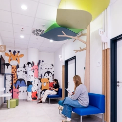 a colorful waiting room for children at the Medicover Krakowiaków center